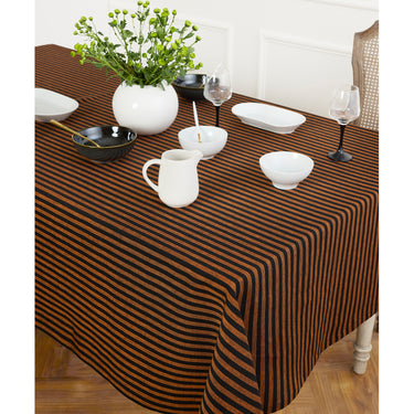 Pumpkin & Black | Amalfi Stripe Pumpkin & Black Tablecloth Textured Linen Tablecloth Styled With Dinnerware And Candles