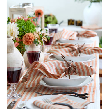 Pumpkin & Natural | Amalfi Stripe Pumpkin & Natural Linen Dinner Napkins Arranged For Dining Décor