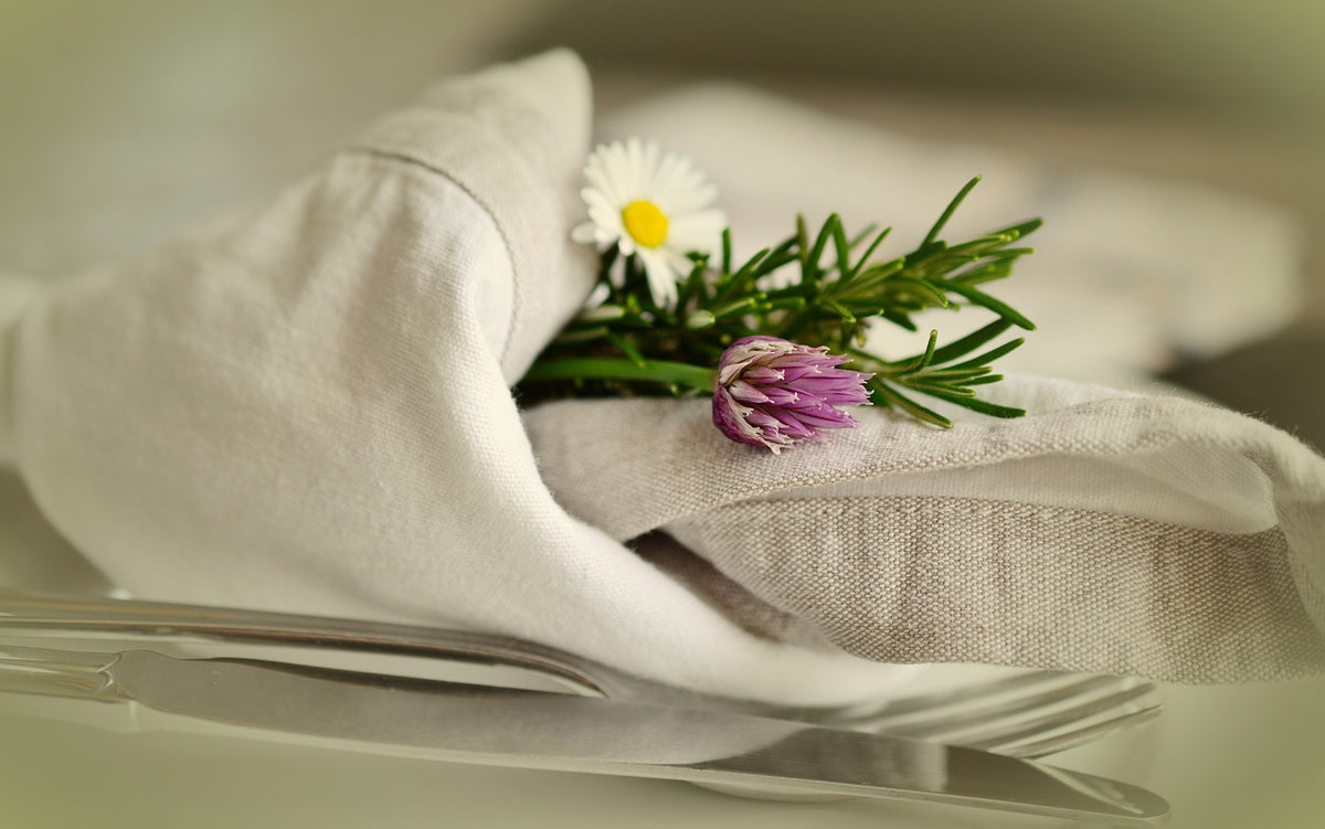Rolling Silverware in a Linen Napkin How to Guide Solino Home