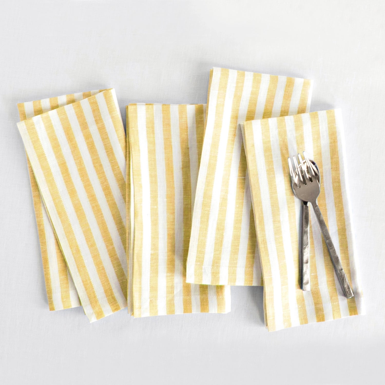 Amalfi Stripe Primrose Yellow & White Linen Dinner Napkins Folded For Product Display