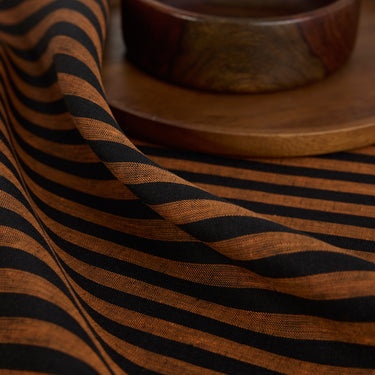 Pumpkin & Black | Amalfi Stripe Pumpkin & Black Linen Table Throw Styled On An Elegant Dining Table