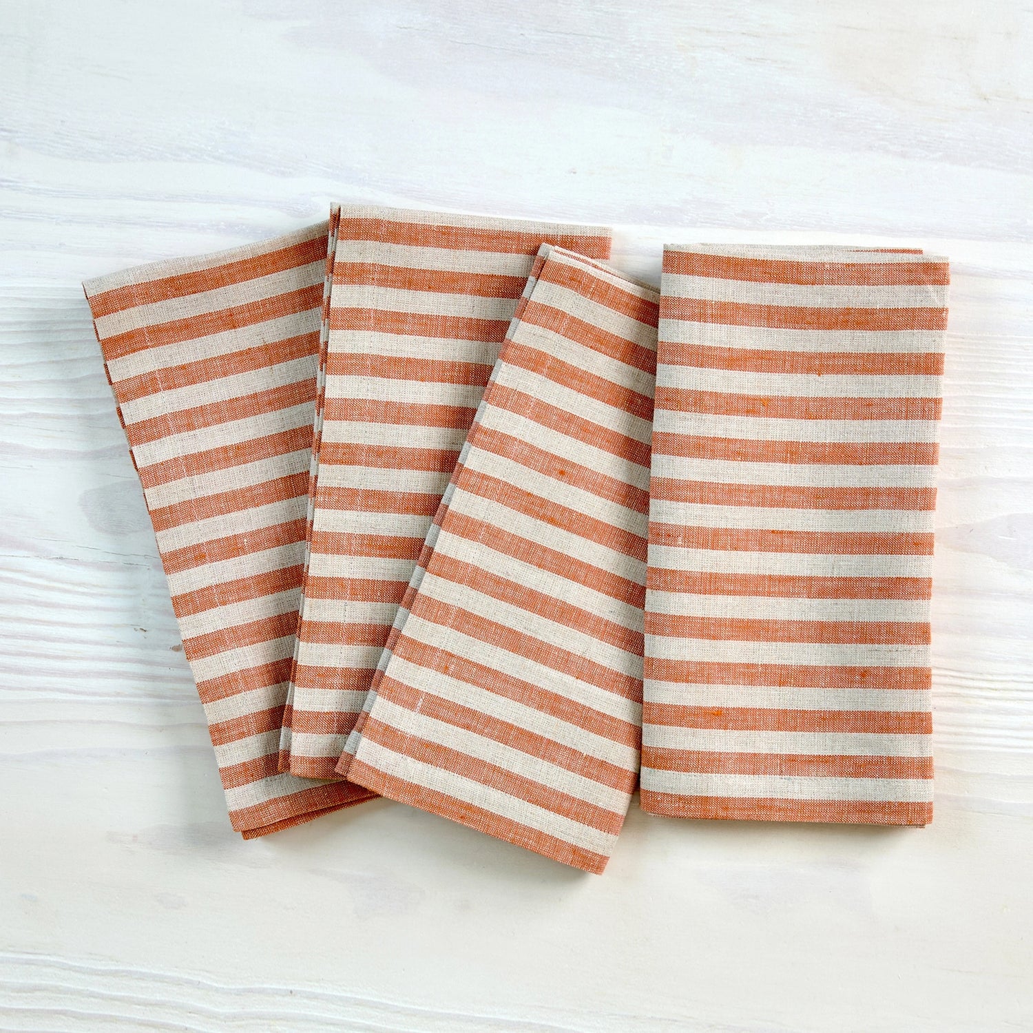 Amalfi Stripe Pumpkin & Natural Linen Dinner Napkins Folded For Product Display