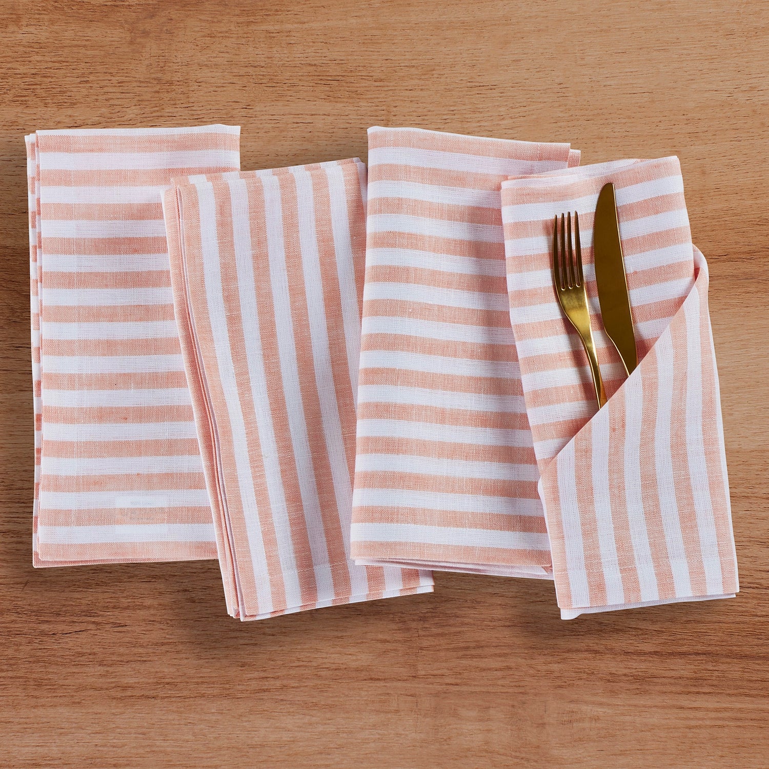 Amalfi Stripe Orange & White Linen Dinner Napkins Folded For Product Display